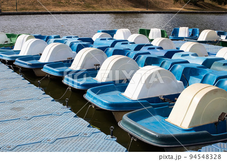 Catamarans parked at the pier on river Catamarans parked at the pier on river 94548328