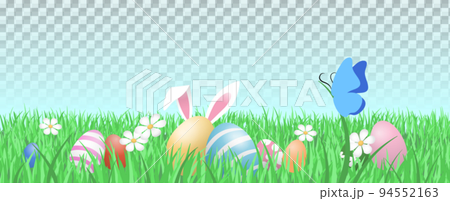 Easter eggs with bunny ears in a garden grass Easter eggs with bunny ears in a garden grass 94552163
