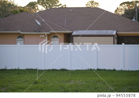White plastic fence for back yard protection and privacy 94553878