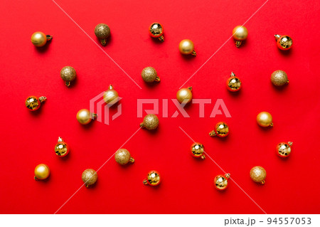 Christmas composition. a pattern of christmas balls on colored background. Flat lay, top view New year decor Christmas composition. a pattern of christmas balls on colored background. Flat lay, top view New year decor 94557053