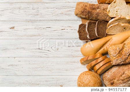 Homemade natural breads. Different kinds of fresh bread as background, top view with copy space 94557177