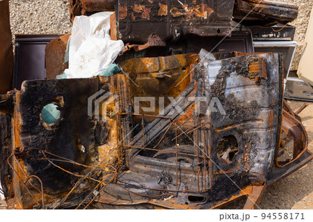 Scrap metal in railway cars.. Scrap yard, metal rubbish stock. Scrap metal in railway cars.. Scrap yard, metal rubbish stock. 94558171