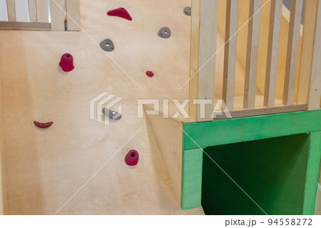 a public children's playground with a climbing house. a public children's playground with a climbing house. 94558272