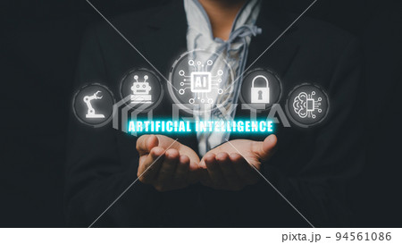Artificial Intelligence AI, Person hand holding holographic brain Artificial Intelligence (AI) icon from the screen, Internet of Things IoT concept. 94561086