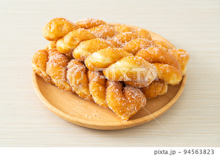sugar doughnut in spiral shape sugar doughnut in spiral shape 94563823
