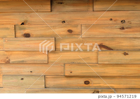 old brown wood plank wall background 94571219