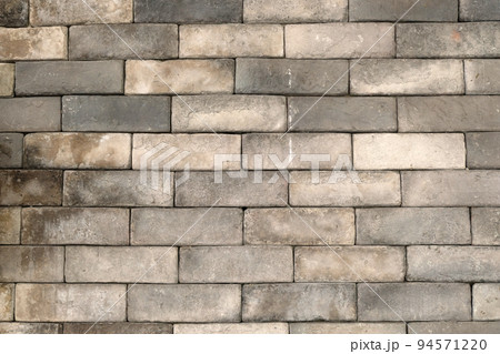 old vintage dirty brown brick wall background 94571220