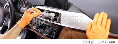 Professional maintenance of car air conditioners closeup 94571660