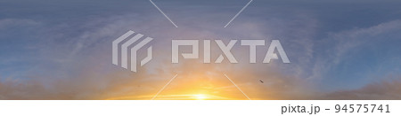Bright sunset sky panorama with Cirrus clouds. Hdr seamless spherical equirectangular 360 panorama. Sky dome or zenith for 3D visualization, game and sky replacement for aerial drone 360 panoramas. Bright sunset sky panorama with Cirrus clouds. Hdr seamless spherical equirectangular 360 panorama. Sky dome or zenith for 3D visualization, game and sky replacement for aerial drone 360 panoramas. 94575741