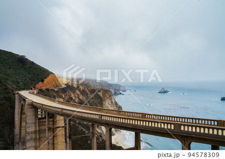 Bridge over cliffs and ocean Bridge over cliffs and ocean 94578309