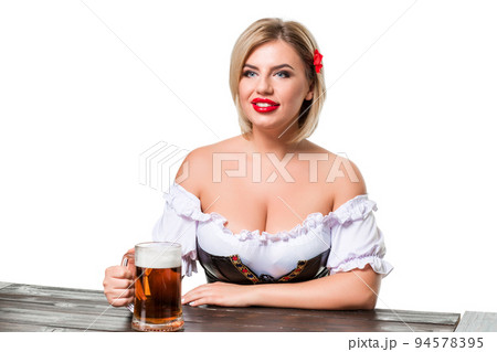 Beautiful young blond girl of oktoberfest beer stein Beautiful young blond girl of oktoberfest beer stein 94578395