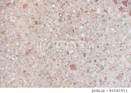 Marble crushed stone texture. Wall or floor of small gravel stones mixed with marble. 94582451