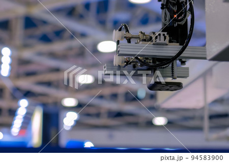 Automatic robotic arm manipulator with suction cups at plant - close up 94583900