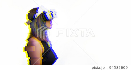 Woman is using virtual reality headset. Concept of virtual, augmented and extended reality and metaverse. Woman is using virtual reality headset. Concept of virtual, augmented and extended reality and metaverse. 94585609