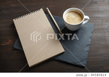 Sketchbook, pencil, coffee cup Sketchbook, pencil, coffee cup 94585814