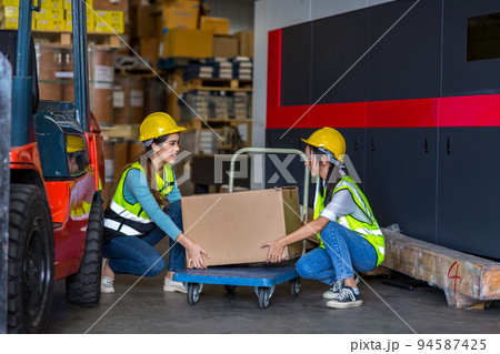 woman worker working in warehouse.  94587425
