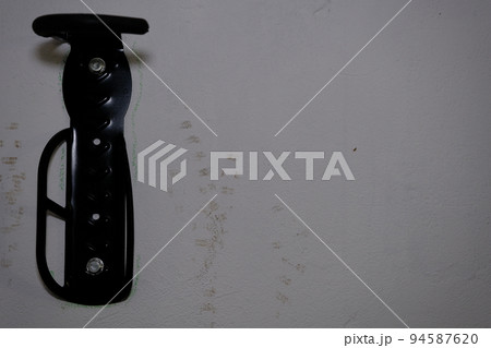 Bicycle tire hook clamp on the wall Bicycle tire hook clamp on the wall 94587620