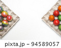 Easter eggs of different colors. Preparing for Easter Week. 94589057