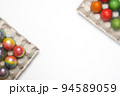 Easter eggs of different colors. Preparing for Easter Week. 94589059