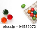 Easter eggs of different colors. Preparing for Easter Week. 94589072