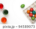 Easter eggs of different colors. Preparing for Easter Week. 94589073