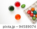 Easter eggs of different colors. Preparing for Easter Week. 94589074