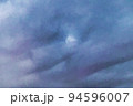Dark clouds have engulfed the sun, until only a vague light is visible. Dark clouds have engulfed the sun, until only a vague light is visible. 94596007