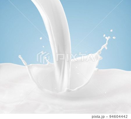 splashing milk on a blue background 94604442