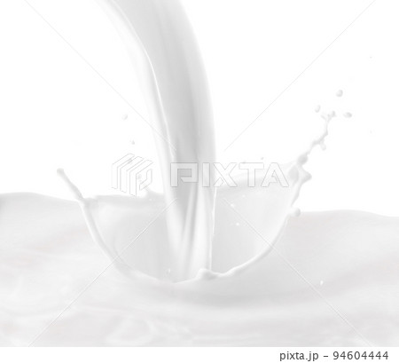 splashing milk on a white background splashing milk on a white background 94604444
