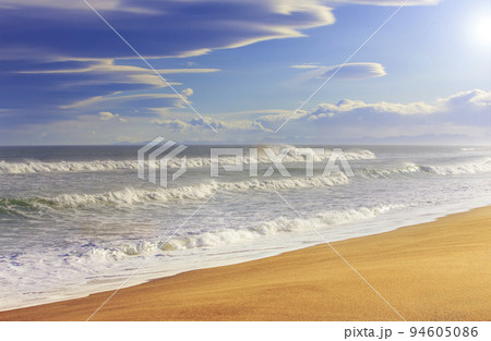 Beautiful yellow sand beach. Blue ocean and yellow sand 94605086