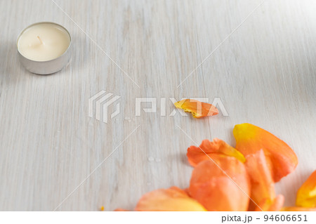 Rose petals and scented candles on the floor. Rose petals and scented candles on the floor. 94606651