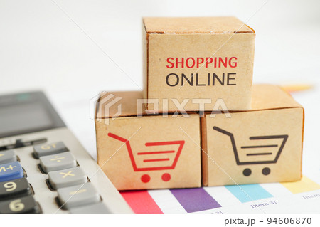 Online shopping, Shopping cart box on calculator, import export, finance commerce. 94606870