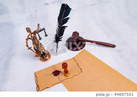 Notary's public pen and stamp on testament and last will. Notary public tools Notary's public pen and stamp on testament and last will. Notary public tools 94607501