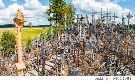 Aerial view of Hill of Crosses or KRYZIU KALNAS in Lithuania. It is a famous religious site of catholic pilgrimage in Lithuania Aerial view of Hill of Crosses or KRYZIU KALNAS in Lithuania. It is a famous religious site of catholic pilgrimage in Lithuania 94611993