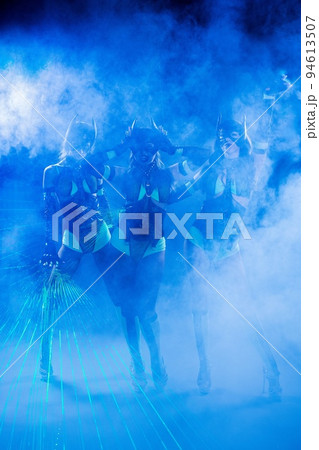 Group of unrecognizable people in neon light 94613507