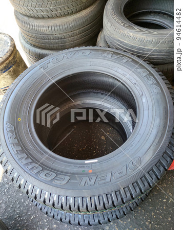MELAKA, MALAYSIA -MAY 5, 2022: The new tire tread. It was designed to provide grip to vehicles and road surfaces to ensure user safety. Have a quality level that needs to be adhered to. MELAKA, MALAYSIA -MAY 5, 2022: The new tire tread. It was designed to provide grip to vehicles and road surfaces to ensure user safety. Have a quality level that needs to be adhered to. 94614482