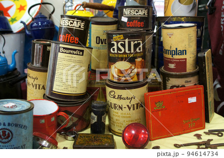 MELAKA, MALAYSIA -MAY 6, 2022: Tins and containers of antique food and beverage products are on display for the public. It is a treasure trove of antiques enthusiasts. Gives nostalgia. 94614734