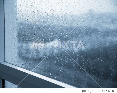 Rain drops on window. Rainy weather Rain drops on window. Rainy weather 94615610