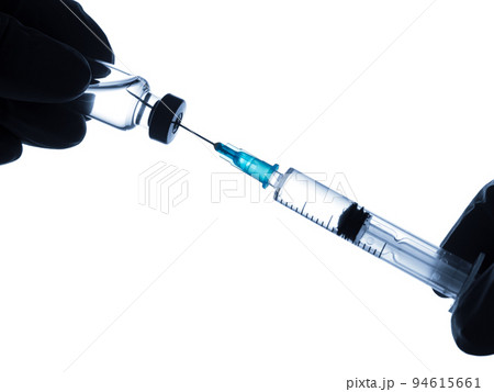 Doctor hand in gloves hold syringe and vaccine bottle on white background. Health and medical concept Doctor hand in gloves hold syringe and vaccine bottle on white background. Health and medical concept 94615661