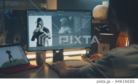 Guy making 3D animation for video game 94616688