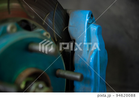 Checking car brake system for repair at car garage 94620088
