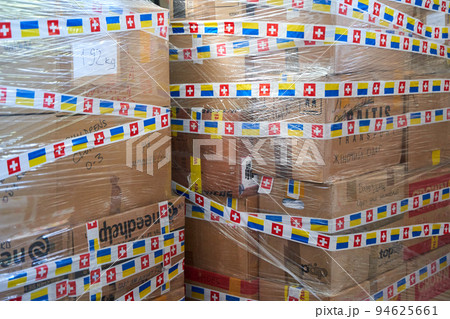 Boxes with humanitarian aid for Ukraine in volunteer centre warehouse 94625661