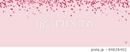 Red holographic star glitter confetti background on pink 94626402