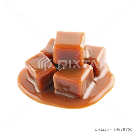 Caramel with caramel  sauce closeup on white backgrounds. 94629750
