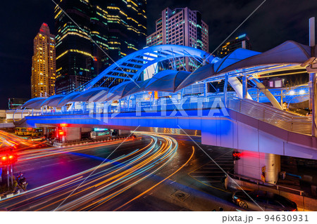 Long exposure of Traffic lighting on Sathorn road, Business center of Bangkok,Thailand. Long exposure of Traffic lighting on Sathorn road, Business center of Bangkok,Thailand. 94630931