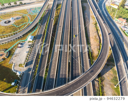 Aerial view of morning junction road from above automobile traffic 94632279