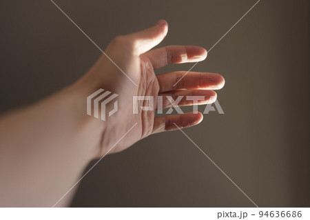 Man hand plays with natural sun light Man hand plays with natural sun light 94636686