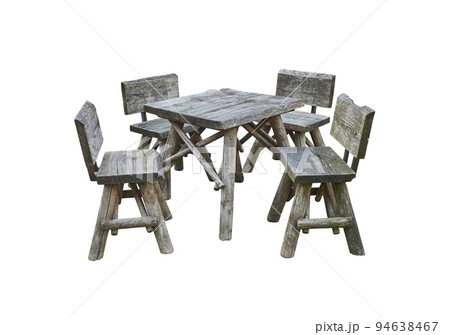 Old wooden outdoor table and chairs on a white background 94638467