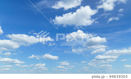 beautiful blue sky with clouds on bright sunny day for abstract background 94639303
