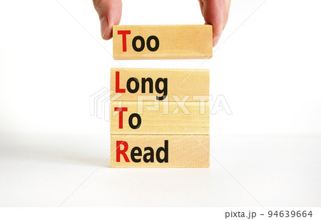 TLTR too long to read symbol. Concept words TLTR too long to read on wooden blocks on a beautiful white background. Businessman hand. Business TLTR too long to read concept. Copy space. 94639664